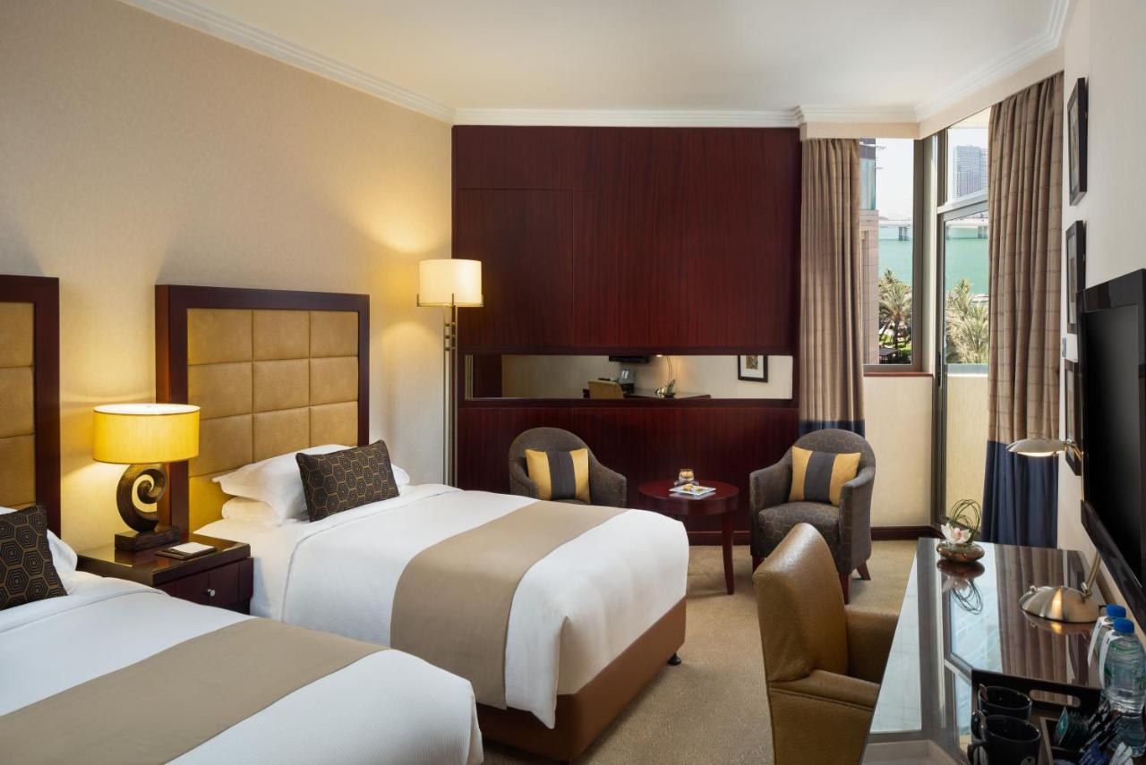 Beach Rotana - Abu Dhabi Bagian luar foto A room at the Conrad London St. George's Wharf