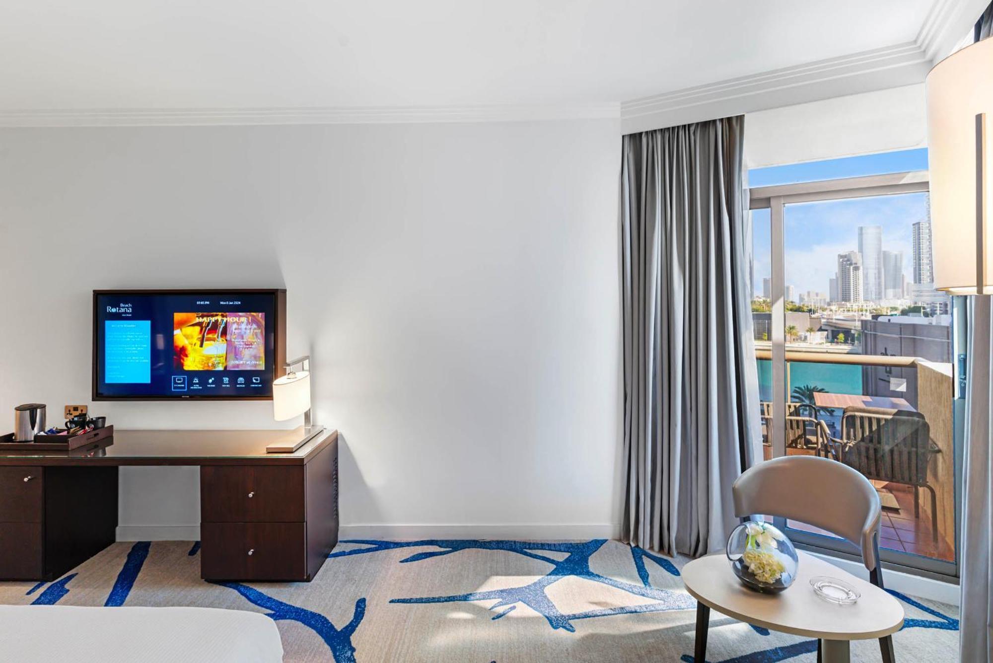 Beach Rotana - Abu Dhabi Bagian luar foto A room at the hotel