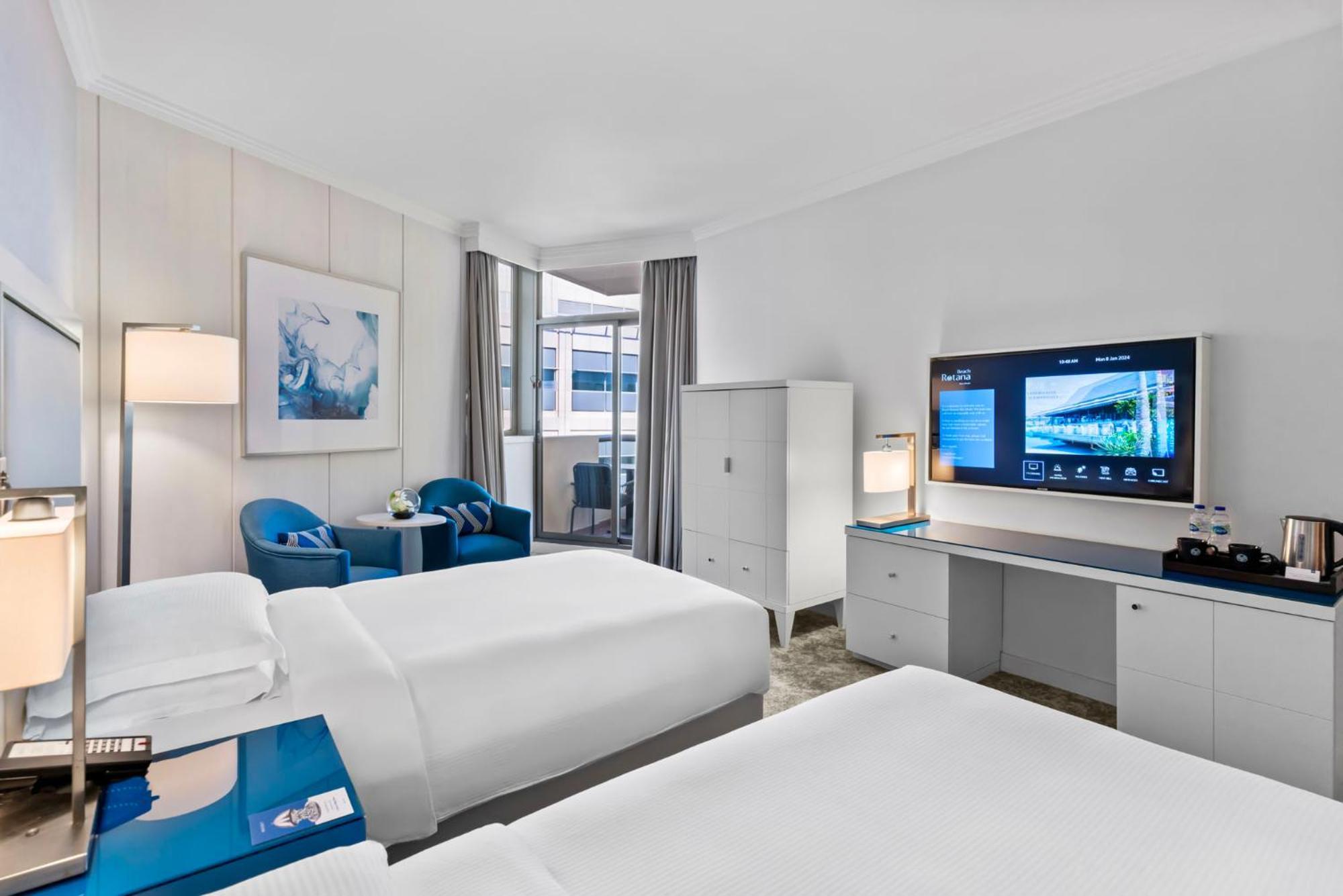 Beach Rotana - Abu Dhabi Bagian luar foto A guest room at the Hilton San Francisco