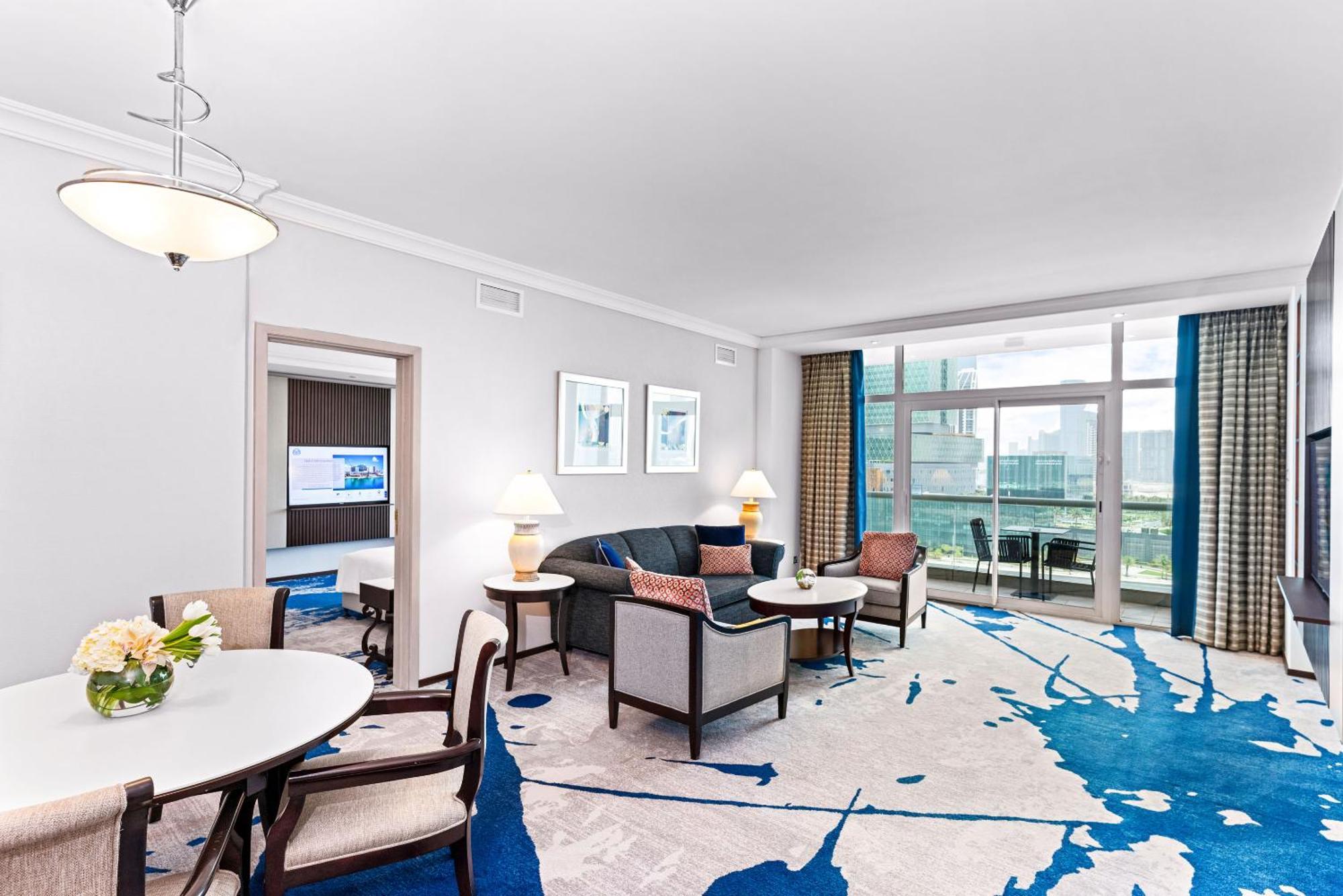 Beach Rotana - Abu Dhabi Bagian luar foto A suite at the Atlantis Paradise Island